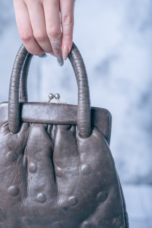 Borsa con apertura a libro